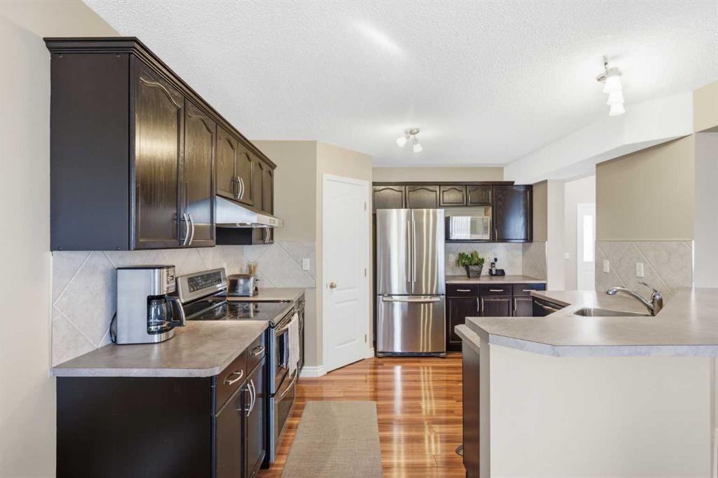 140 Arbour Stone Crescent Nw, Calgary, AB - Indoor Photo Showing Kitchen
