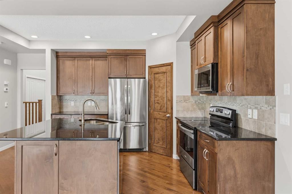40 Panatella Mews Nw, Calgary, AB - Indoor Photo Showing Kitchen With Stainless Steel Kitchen