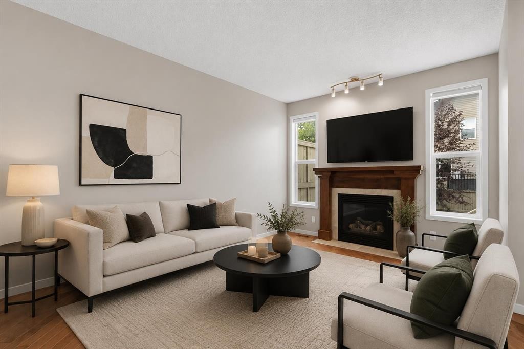 40 Panatella Mews Nw, Calgary, AB - Indoor Photo Showing Living Room With Fireplace