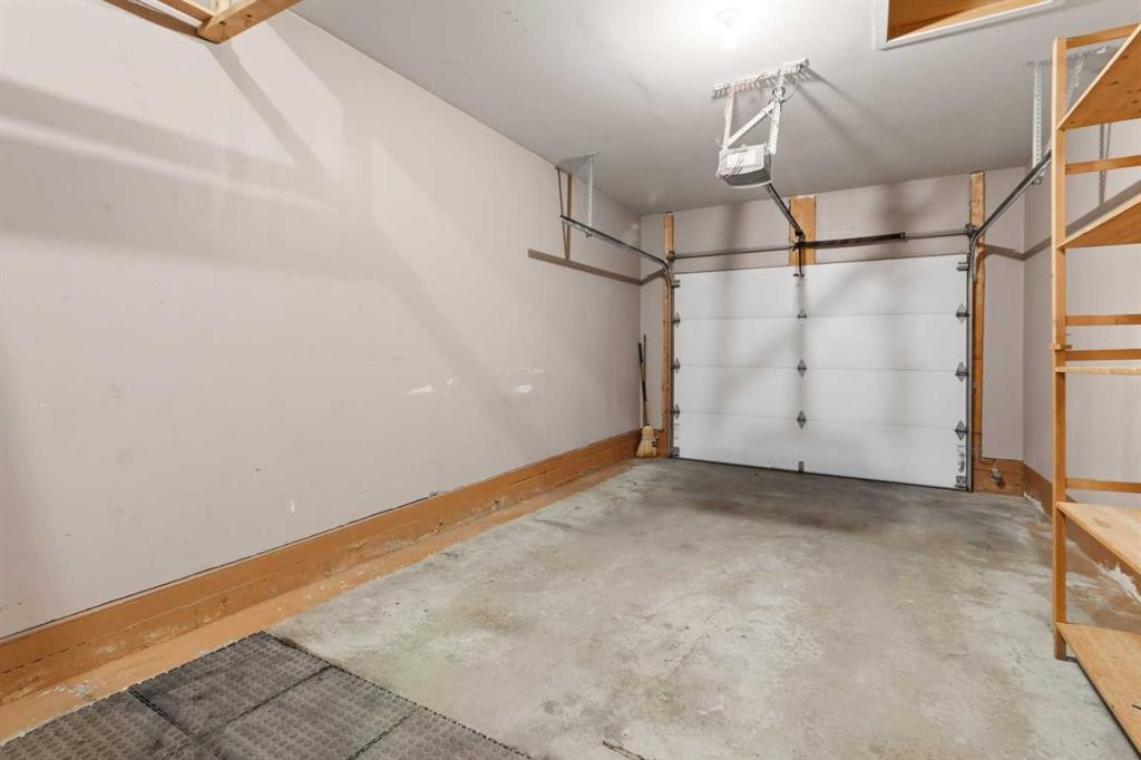 40 Panatella Mews Nw, Calgary, AB - Indoor Photo Showing Garage