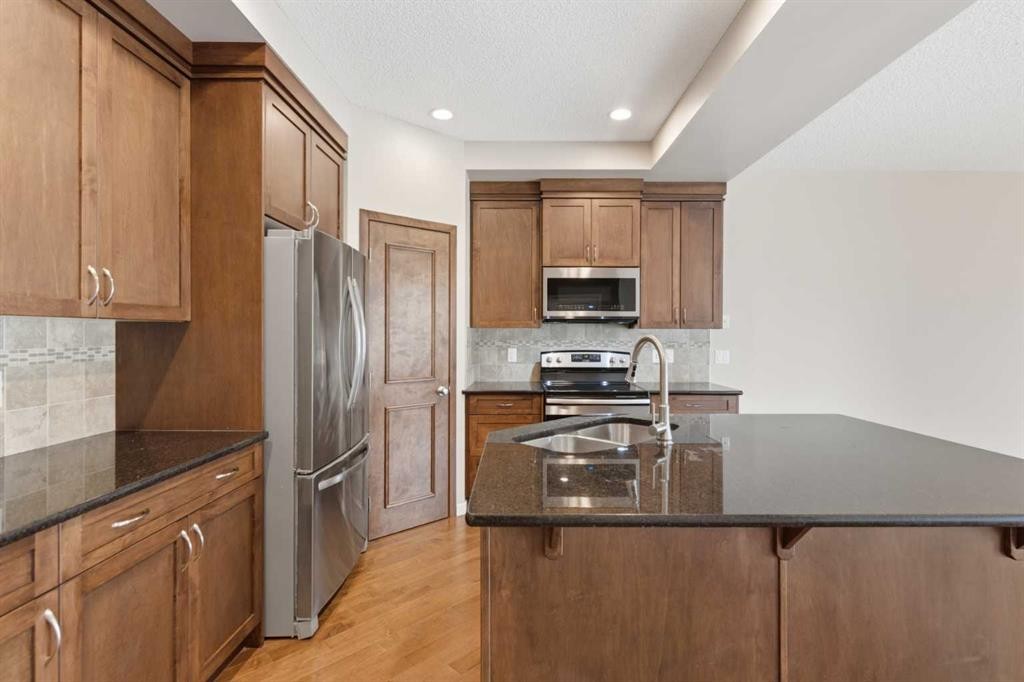 40 Panatella Mews Nw, Calgary, AB - Indoor Photo Showing Kitchen With Stainless Steel Kitchen With Double Sink