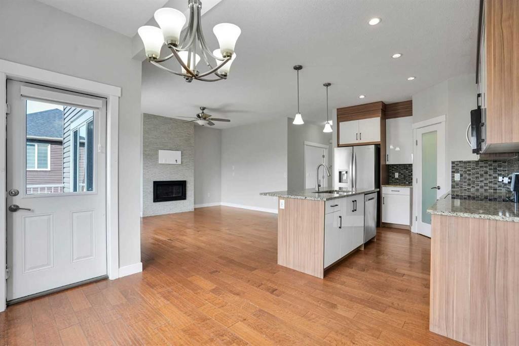 368 Nolanhurst Crescent Nw, Calgary, AB - Indoor Photo Showing Kitchen With Fireplace