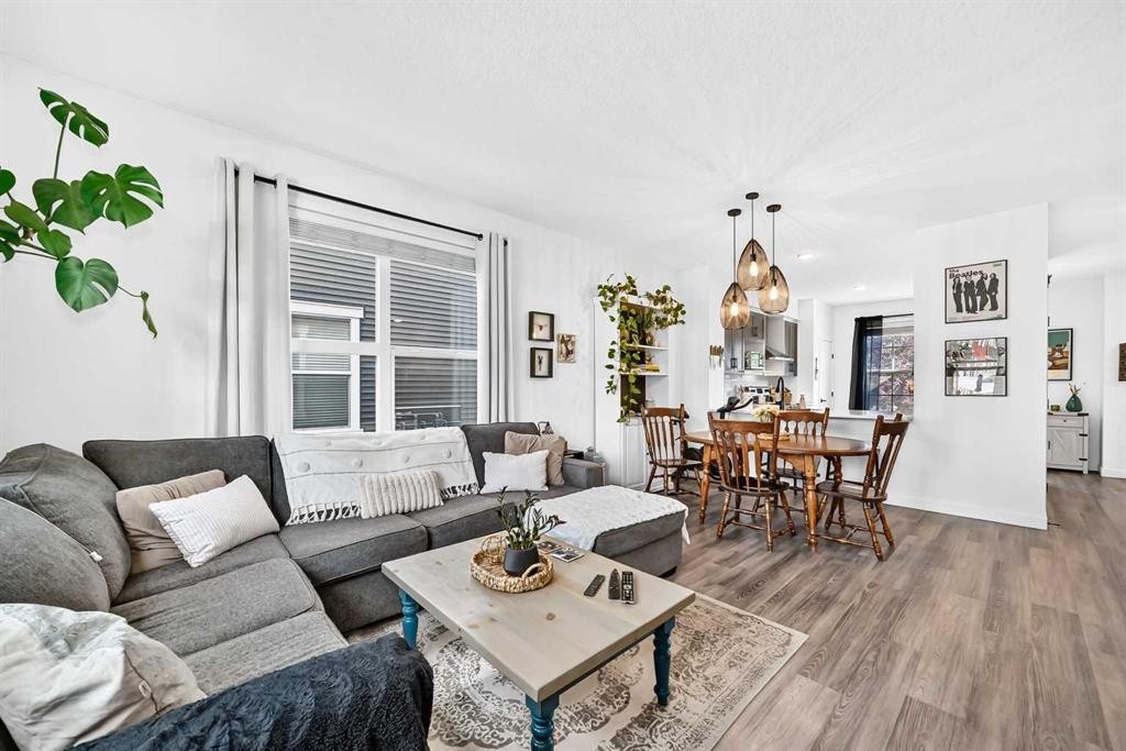 162 Silverado Boulevard Sw, Calgary, AB - Indoor Photo Showing Living Room