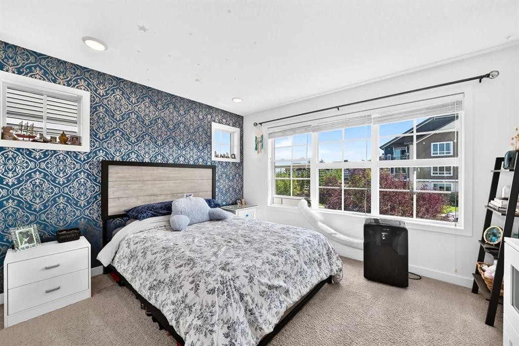 162 Silverado Boulevard Sw, Calgary, AB - Indoor Photo Showing Bedroom