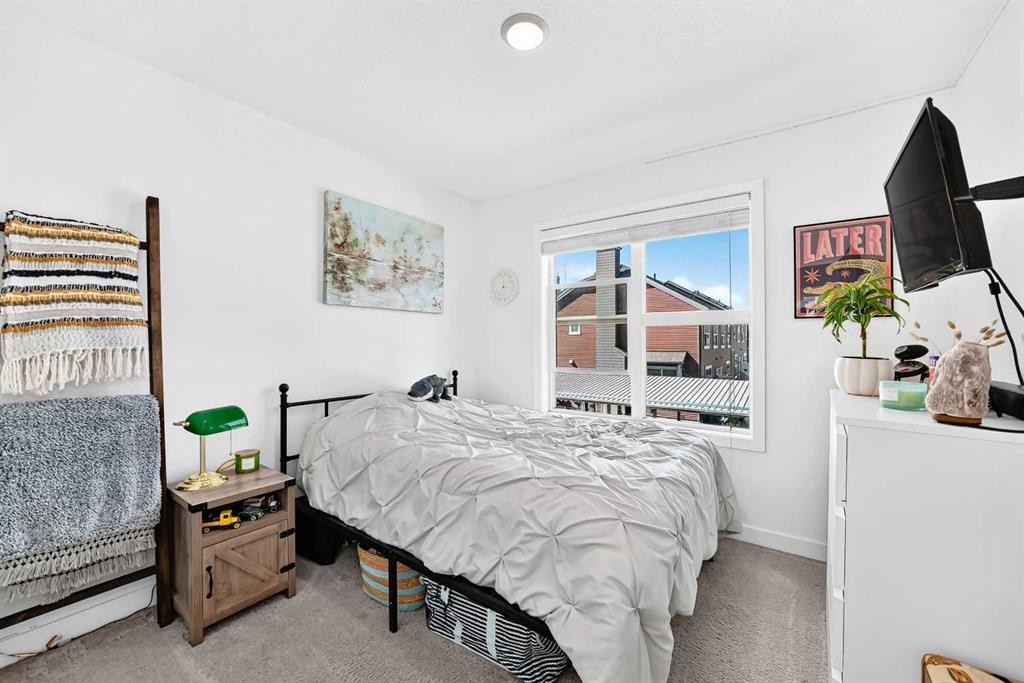 162 Silverado Boulevard Sw, Calgary, AB - Indoor Photo Showing Bedroom