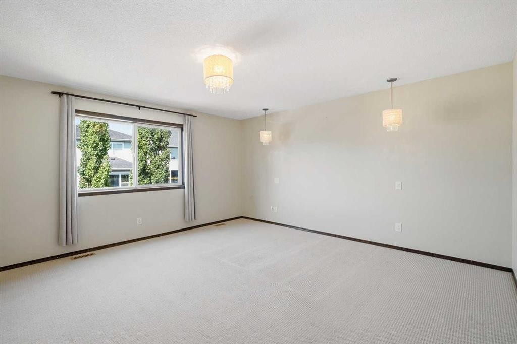 691 Panamount Boulevard Nw, Calgary, AB - Indoor Photo Showing Other Room