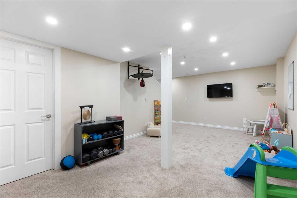 8 Midridge Bay Se, Calgary, AB - Indoor Photo Showing Basement