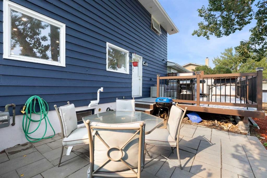 8 Midridge Bay Se, Calgary, AB - Outdoor With Deck Patio Veranda With Exterior