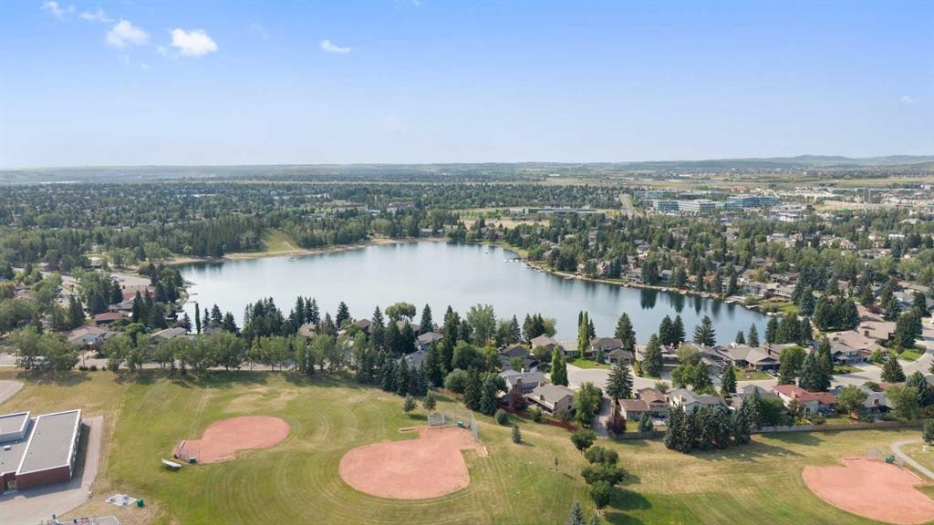 8 Midridge Bay Se, Calgary, AB - Outdoor With Body Of Water With View