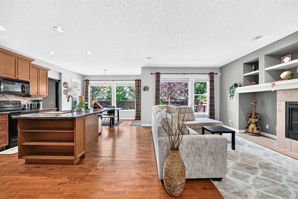 153 Cranleigh Bay Se, Calgary, AB - Indoor With Fireplace