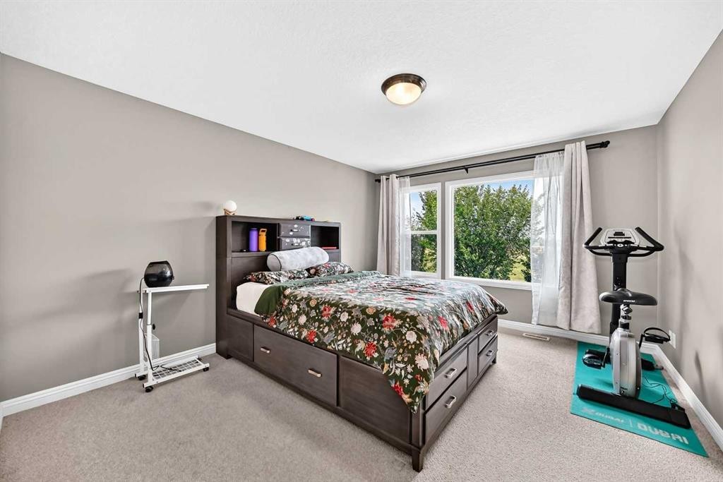 153 Cranleigh Bay Se, Calgary, AB - Indoor Photo Showing Bedroom