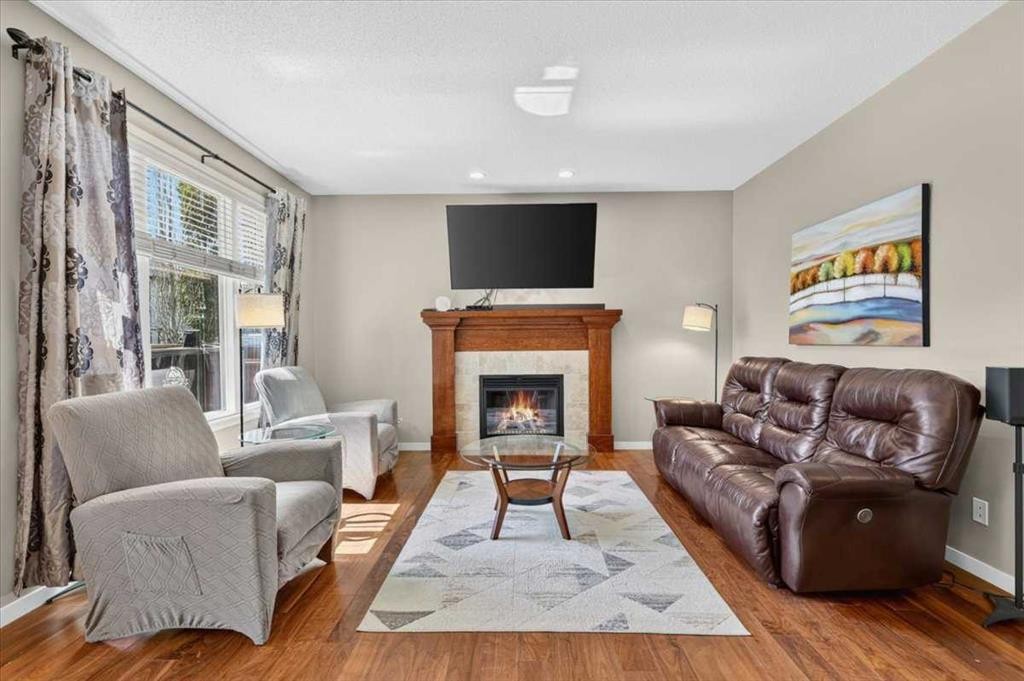1017 Brightoncrest Common Se, Calgary, AB - Indoor Photo Showing Living Room With Fireplace