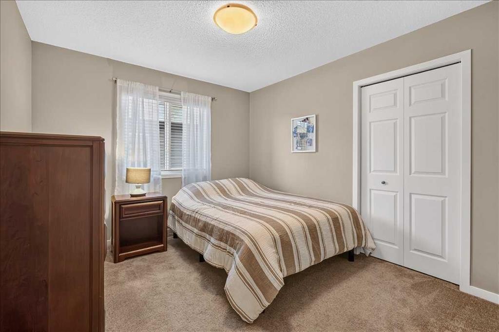 1017 Brightoncrest Common Se, Calgary, AB - Indoor Photo Showing Bedroom