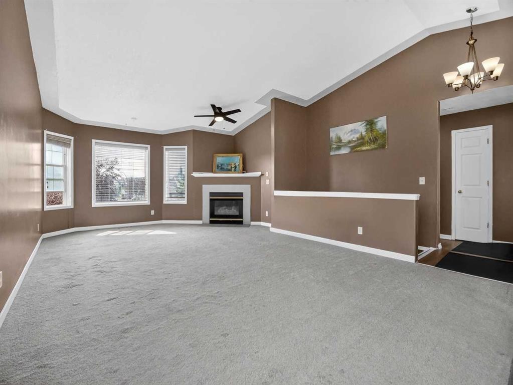 285 Fresno Place Ne, Calgary, AB - Indoor With Fireplace