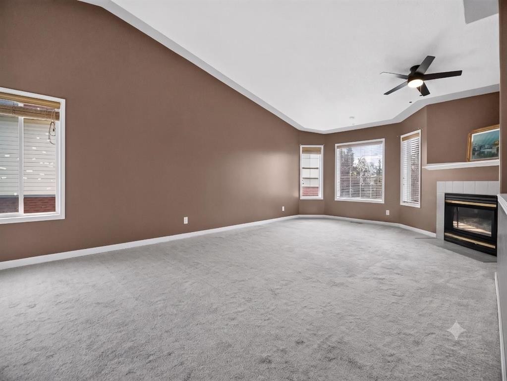 285 Fresno Place Ne, Calgary, AB - Indoor With Fireplace