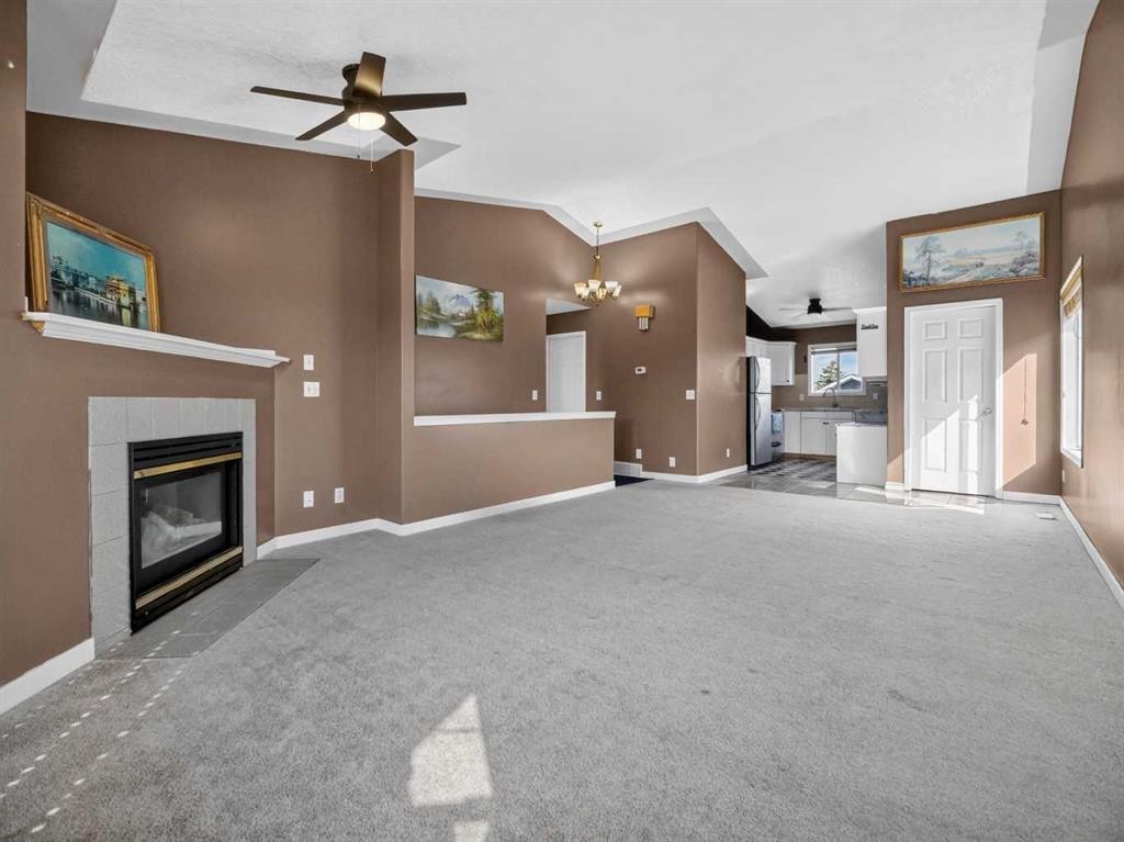 285 Fresno Place Ne, Calgary, AB - Indoor With Fireplace