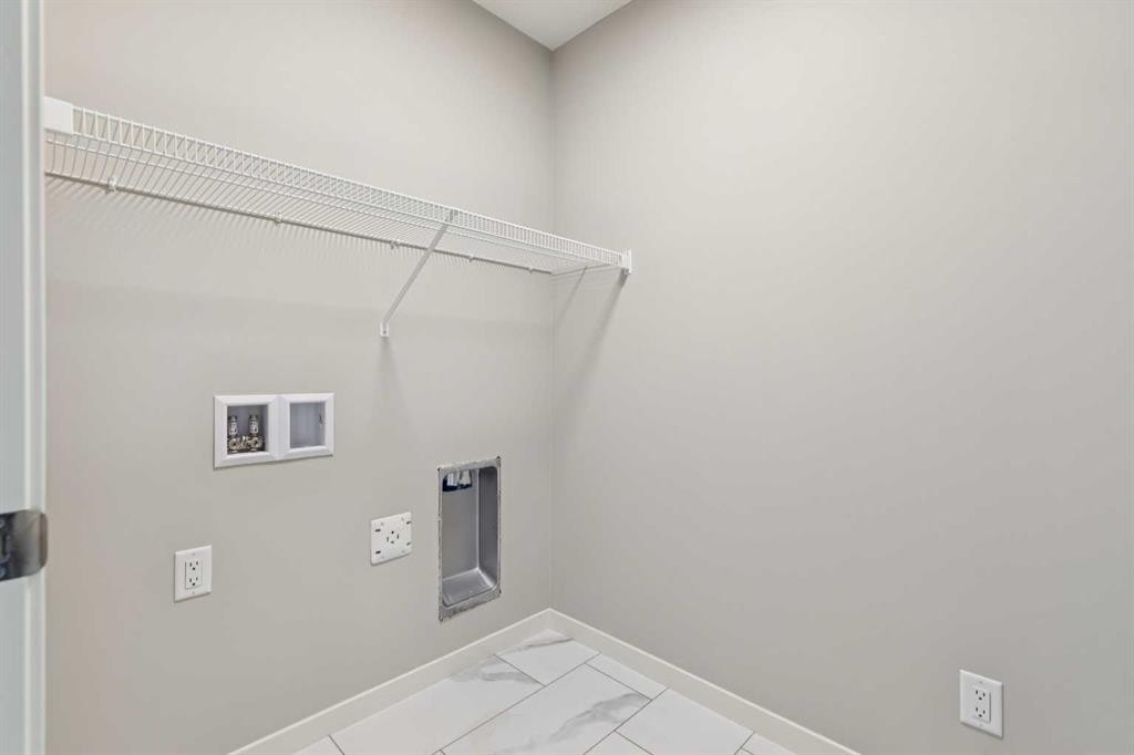 471 Hotchkiss Manor Se, Calgary, AB - Indoor With Storage