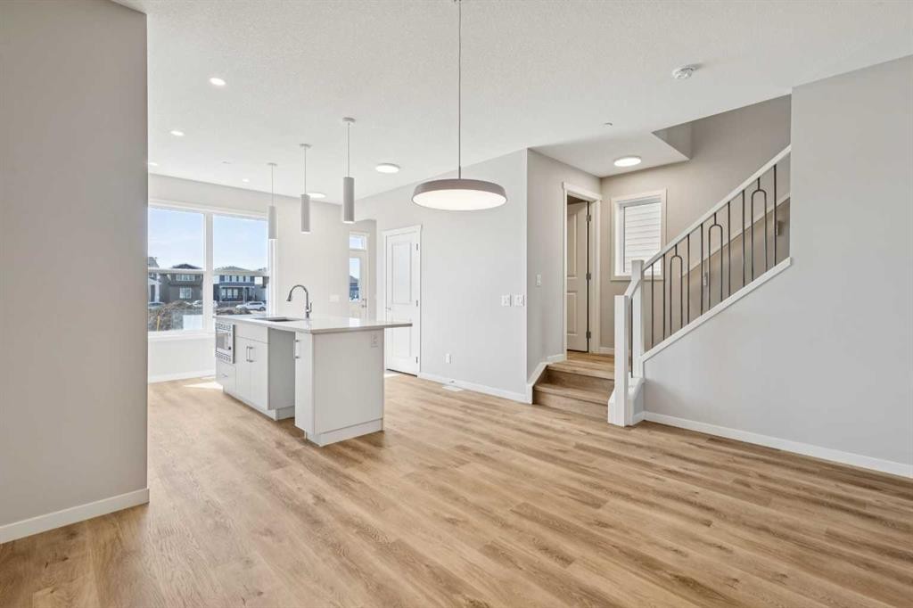 471 Hotchkiss Manor Se, Calgary, AB - Indoor Photo Showing Kitchen With Upgraded Kitchen