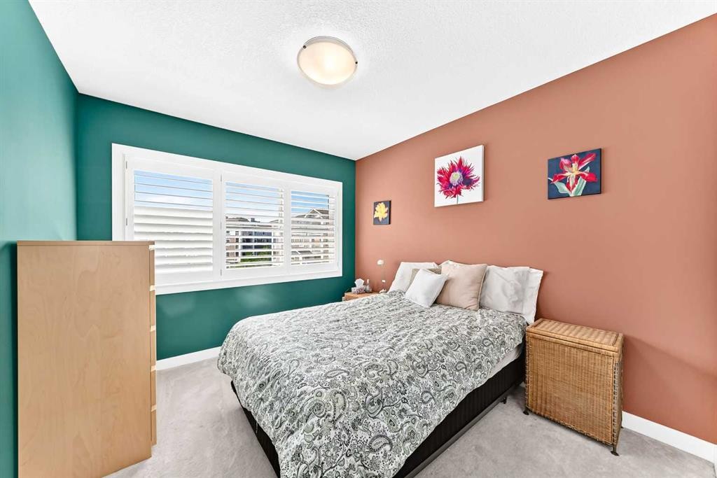 532 Cranford Drive Se, Calgary, AB - Indoor Photo Showing Bedroom