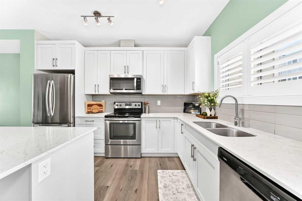 532 Cranford Drive Se, Calgary, AB - Indoor Photo Showing Kitchen With Double Sink With Upgraded Kitchen