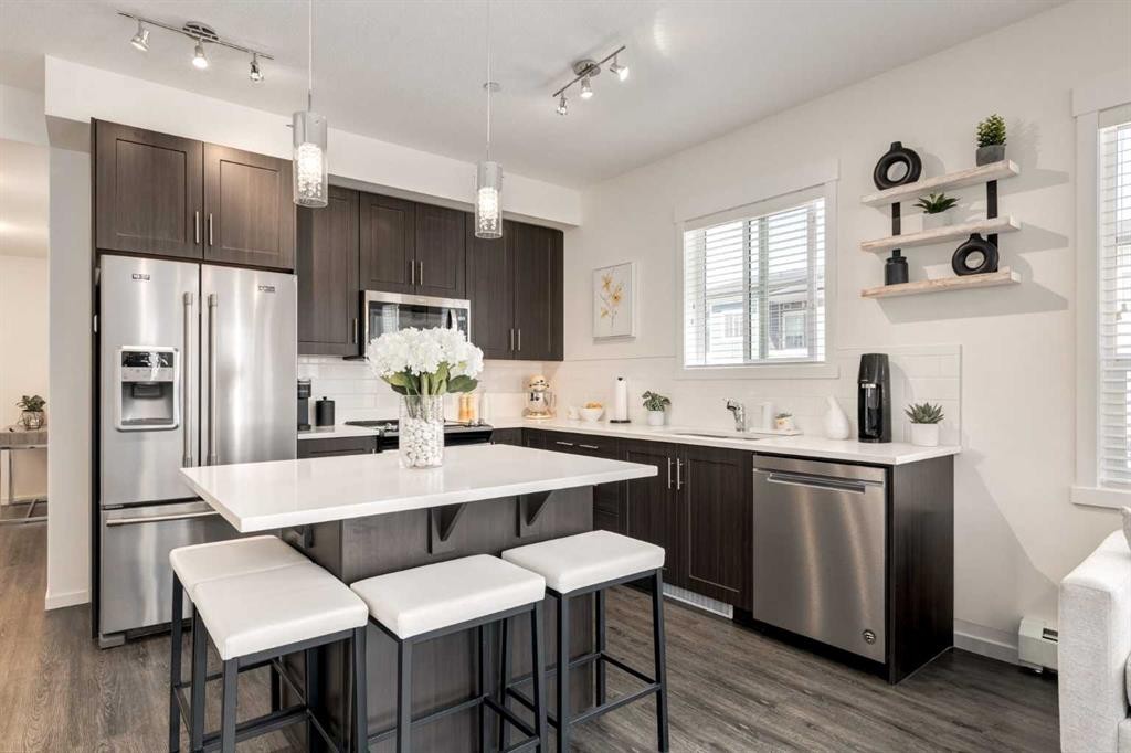 7310-151 Legacy Main Street Se, Calgary, AB - Indoor Photo Showing Kitchen With Stainless Steel Kitchen With Upgraded Kitchen