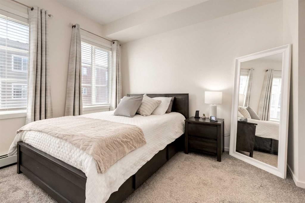 7310-151 Legacy Main Street Se, Calgary, AB - Indoor Photo Showing Bedroom