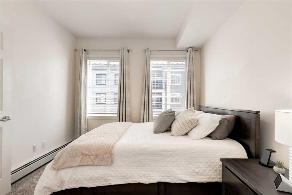 7310-151 Legacy Main Street Se, Calgary, AB - Indoor Photo Showing Bedroom