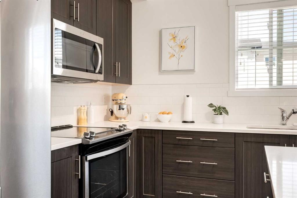 7310-151 Legacy Main Street Se, Calgary, AB - Indoor Photo Showing Kitchen With Upgraded Kitchen