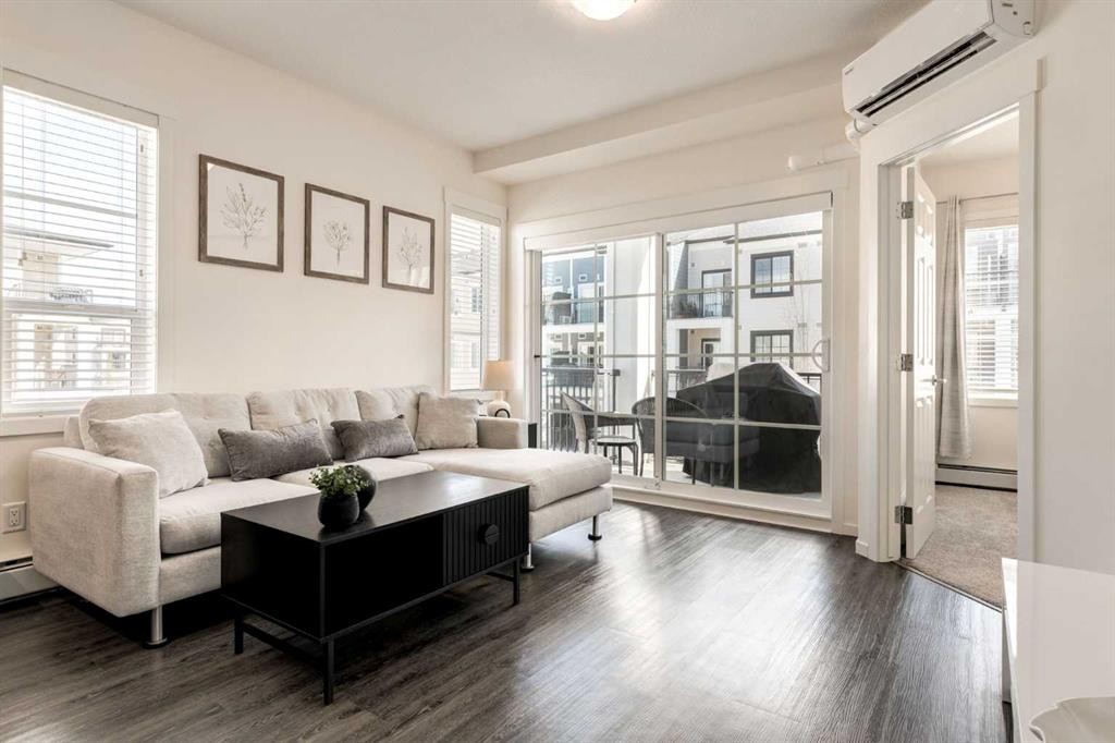 7310-151 Legacy Main Street Se, Calgary, AB - Indoor Photo Showing Living Room