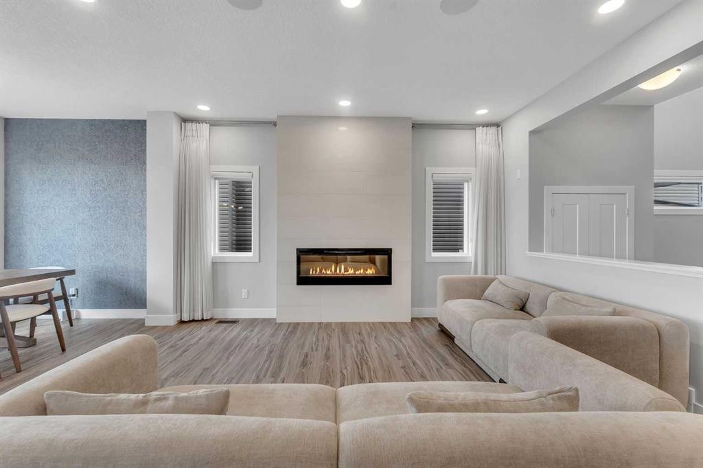 81 Carringvue Manor Nw, Calgary, AB - Indoor Photo Showing Living Room With Fireplace
