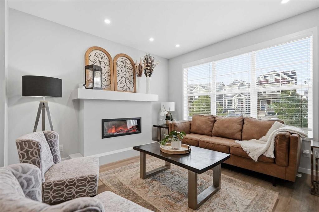 578 Masters Road Se, Calgary, AB - Indoor Photo Showing Living Room With Fireplace