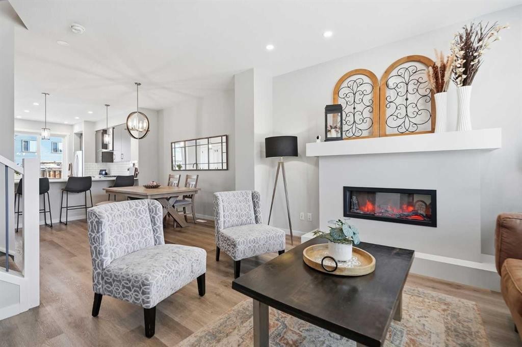 578 Masters Road Se, Calgary, AB - Indoor Photo Showing Living Room With Fireplace