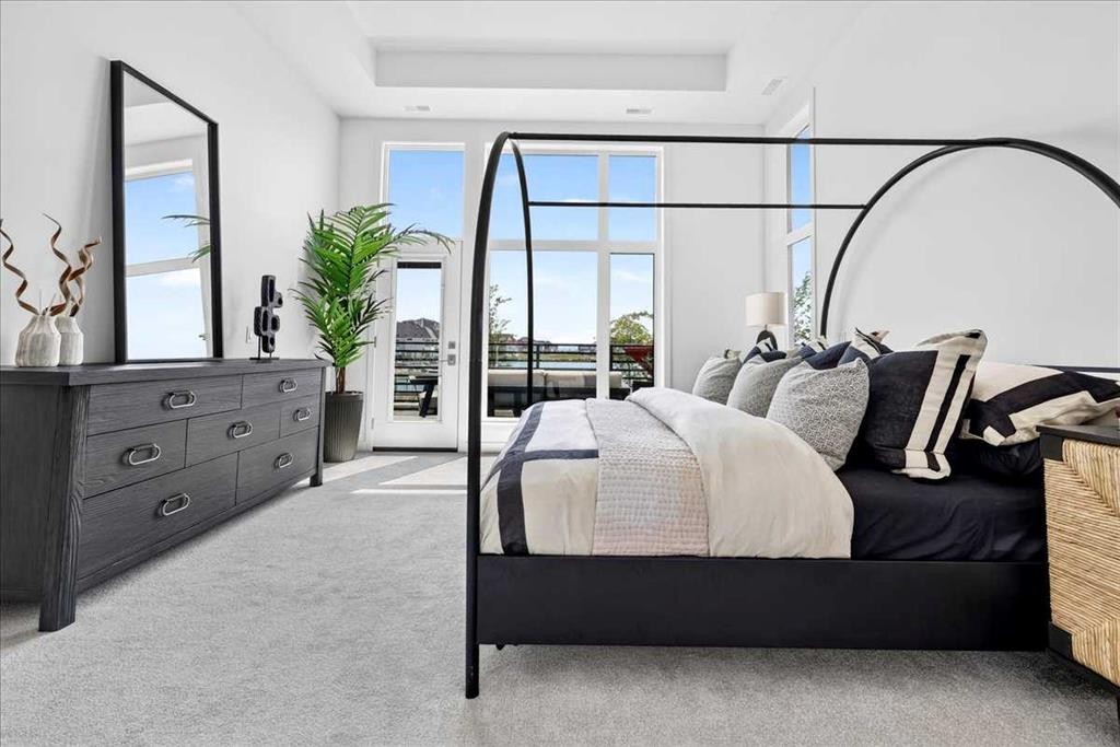 102-150 Marina Cove Se, Calgary, AB - Indoor Photo Showing Bedroom