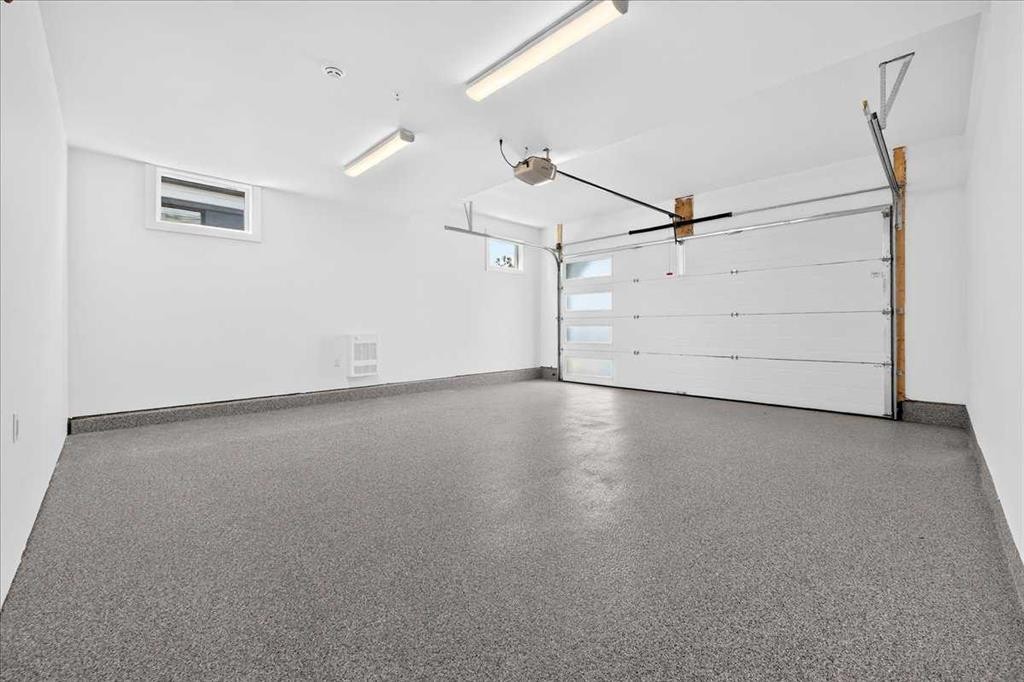 102-150 Marina Cove Se, Calgary, AB - Indoor Photo Showing Garage