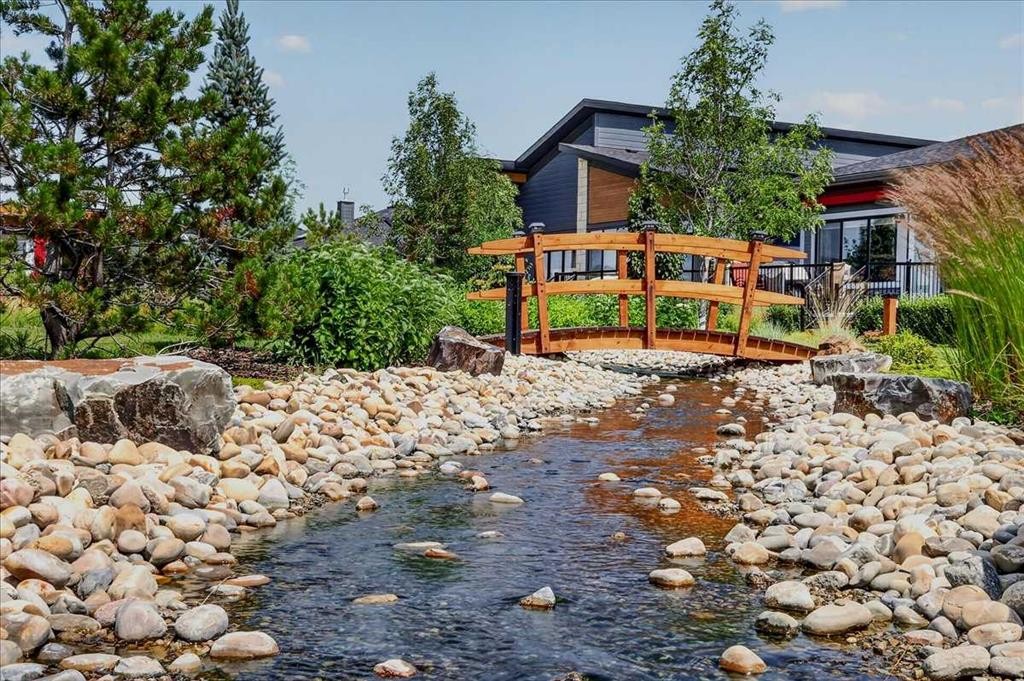 102-150 Marina Cove Se, Calgary, AB - Outdoor With Body Of Water