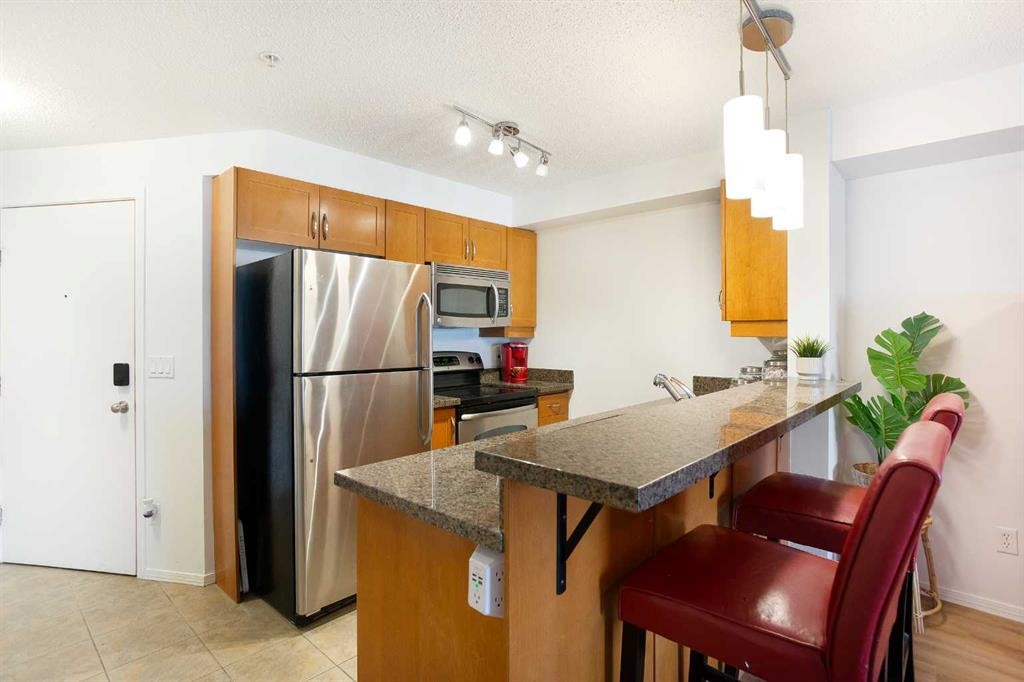 4310-60 Panatella Street Nw, Calgary, AB - Indoor Photo Showing Kitchen With Stainless Steel Kitchen