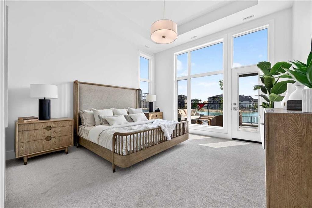 101-150 Marina Cove Se, Calgary, AB - Indoor Photo Showing Bedroom