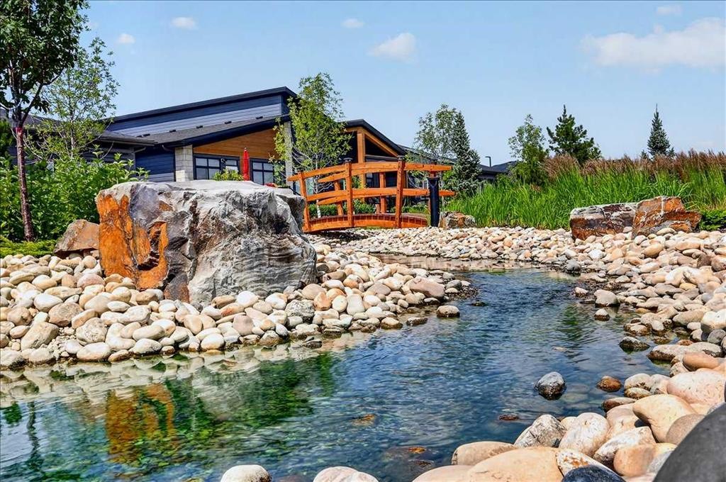 101-150 Marina Cove Se, Calgary, AB - Outdoor With Body Of Water