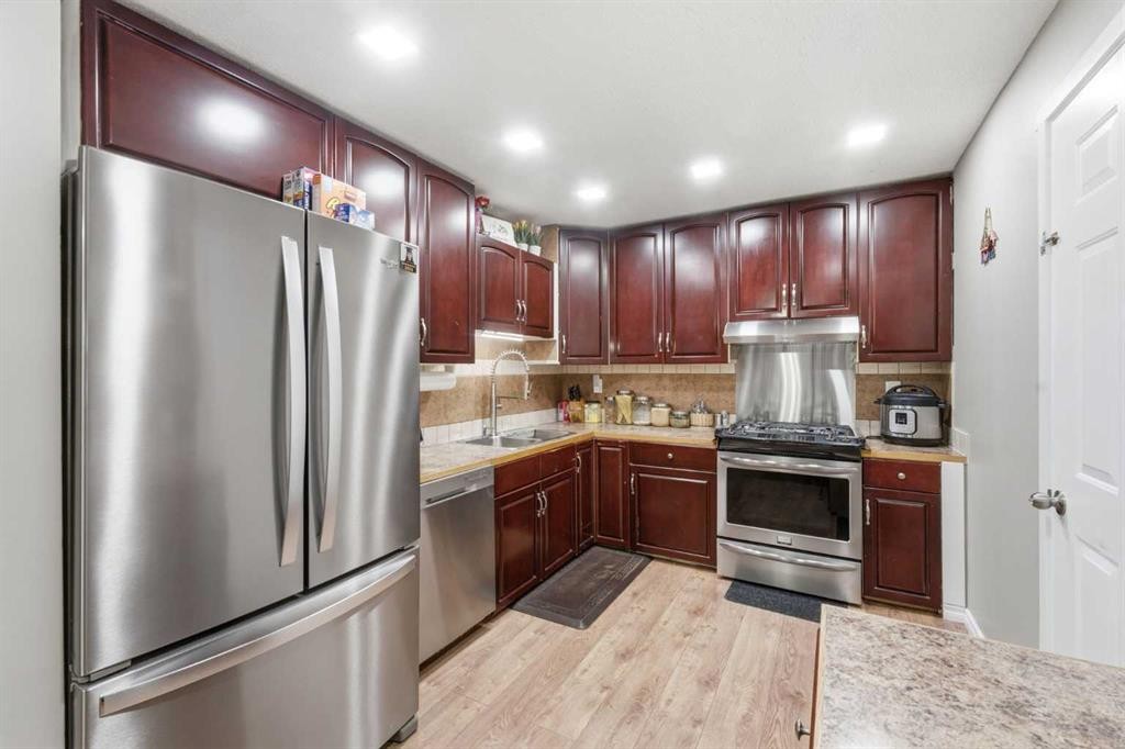 227 Abalone Place Ne, Calgary, AB - Indoor Photo Showing Kitchen With Stainless Steel Kitchen