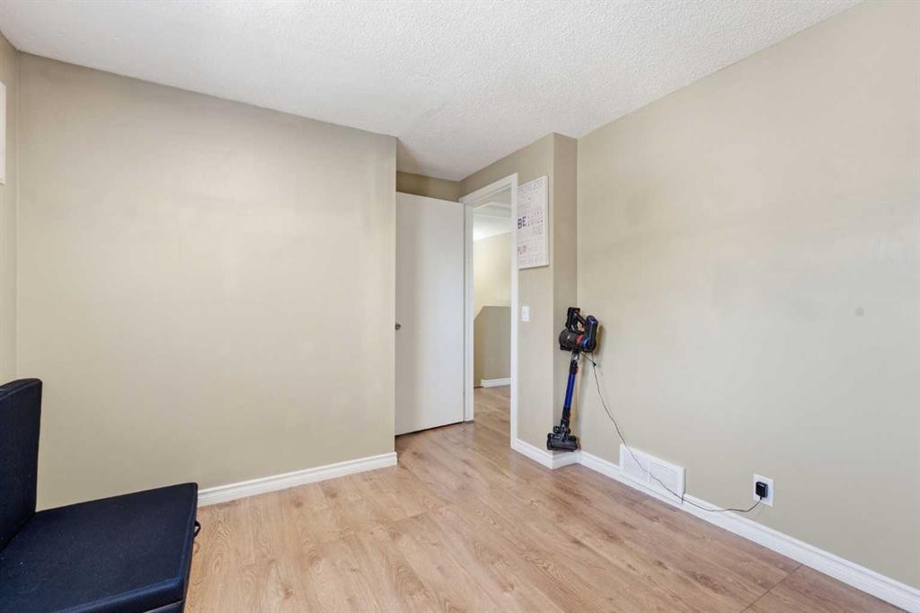 227 Abalone Place Ne, Calgary, AB - Indoor Photo Showing Other Room