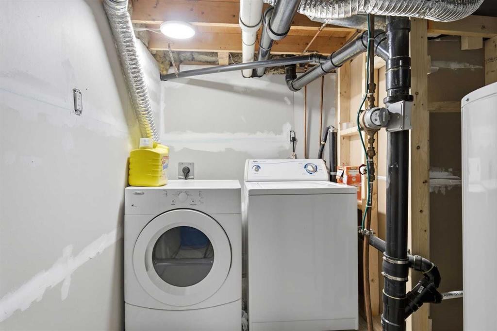 227 Abalone Place Ne, Calgary, AB - Indoor Photo Showing Laundry Room