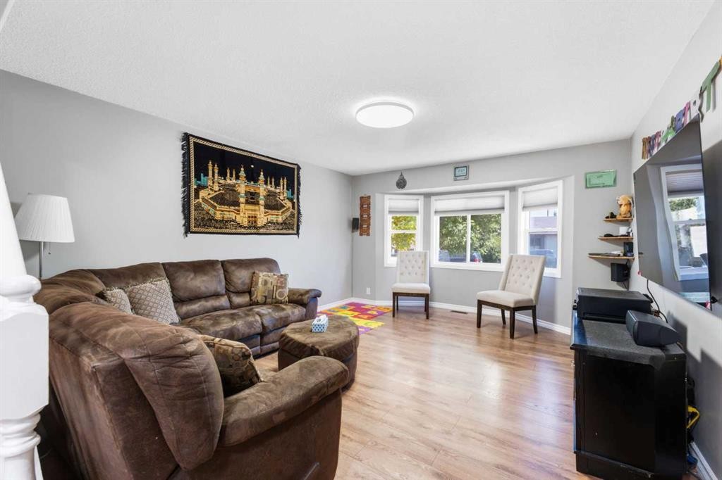 227 Abalone Place Ne, Calgary, AB - Indoor Photo Showing Living Room