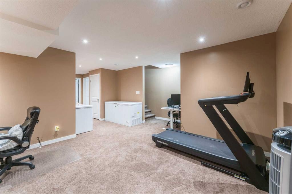 57 Sage Bank Grove Nw, Calgary, AB - Indoor Photo Showing Gym Room