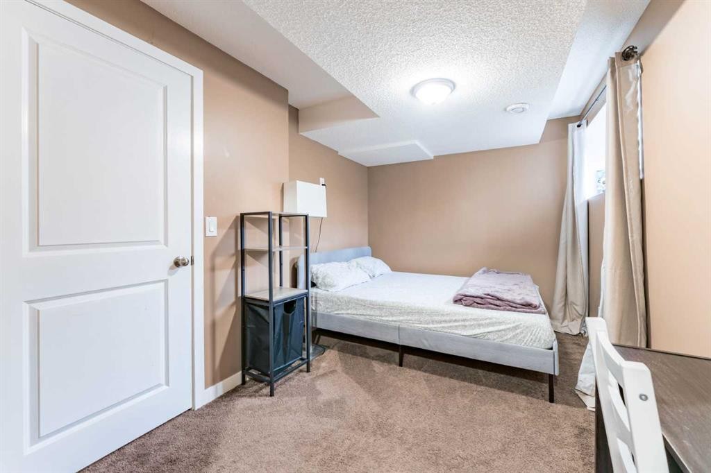 57 Sage Bank Grove Nw, Calgary, AB - Indoor Photo Showing Bedroom