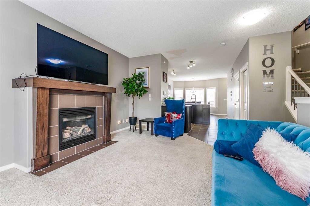 57 Sage Bank Grove Nw, Calgary, AB - Indoor Photo Showing Living Room With Fireplace