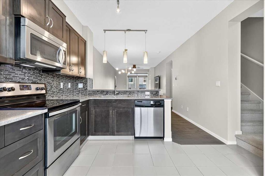 77 Kinlea Way Nw, Calgary, AB - Indoor Photo Showing Kitchen With Stainless Steel Kitchen With Upgraded Kitchen