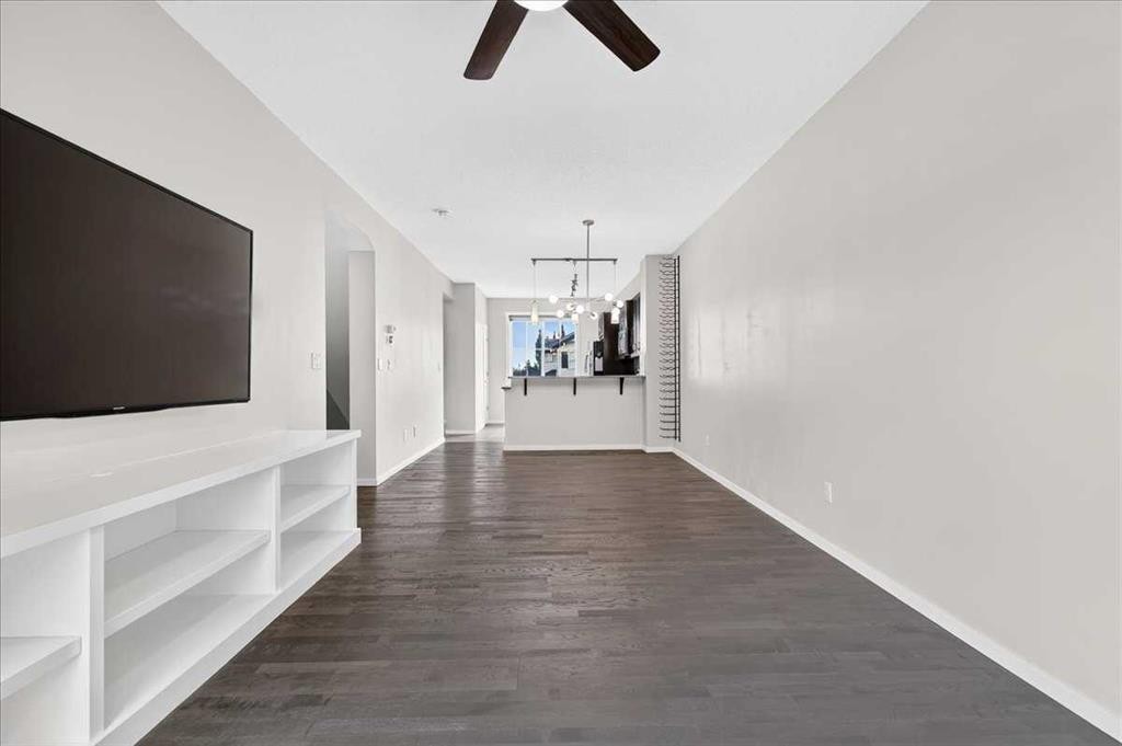 77 Kinlea Way Nw, Calgary, AB - Indoor Photo Showing Other Room