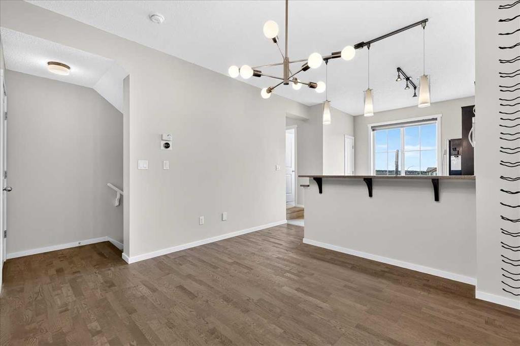 77 Kinlea Way Nw, Calgary, AB - Indoor Photo Showing Other Room
