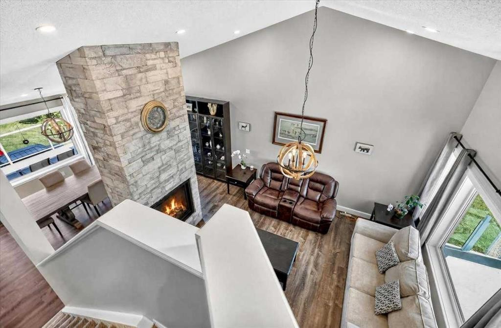 76-16044 258 Avenue East, Rural Foothills County, AB - Indoor With Fireplace
