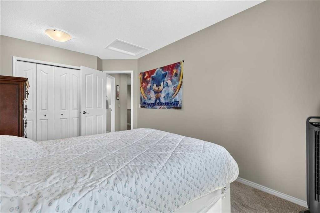 76-16044 258 Avenue East, Rural Foothills County, AB - Indoor Photo Showing Bedroom